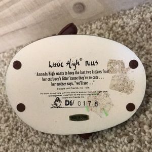 Lizzie High Collection: Amanda High and kittens.